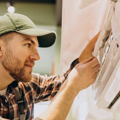 Repairman doing air conditioner servise Repairman doing air conditioner servise